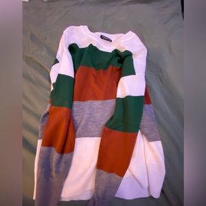 green orange and white sweater